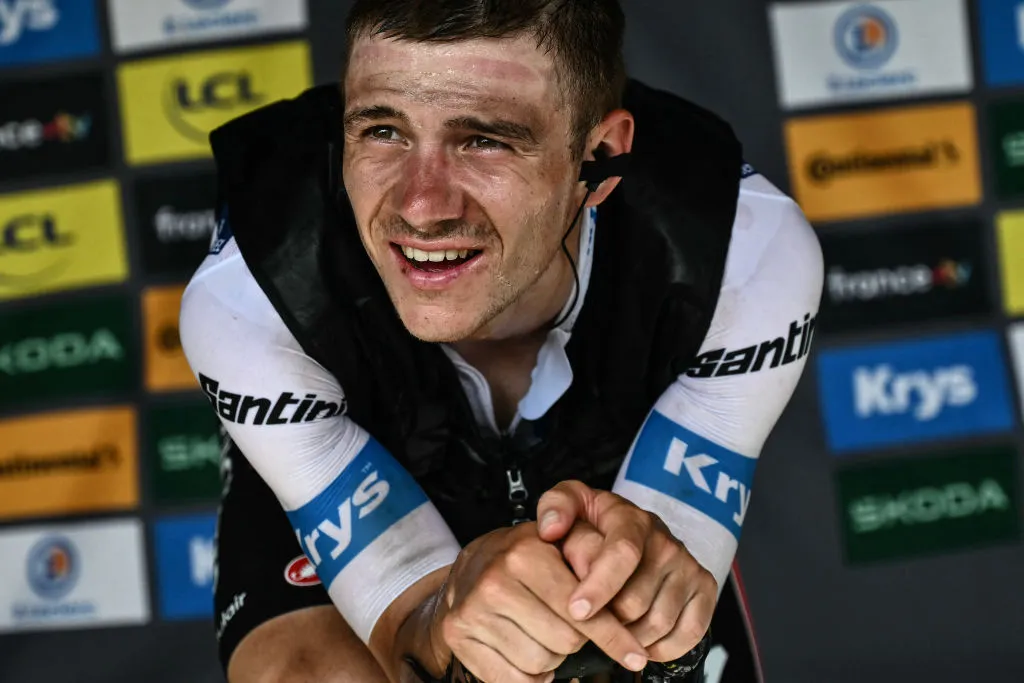 Soudal Quick-Step team's Belgian rider Remco Evenepoel cools down on a hometrainer bicycle after the 15th stage of the 111th edition of the Tour de France cycling race, 197,7 km between Loudenvielle and Plateau de Beille, in the Pyrenees mountains, southwestern France, on July 14, 2024